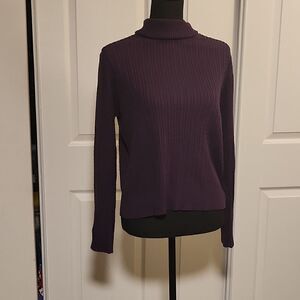 Valerie Steven's turtleneck sweater  